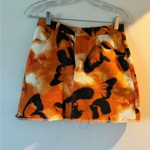 Orange and black mini skirt size S